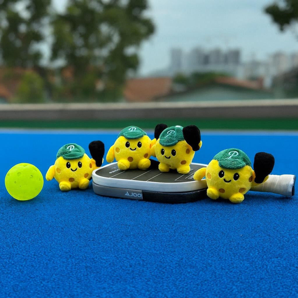 Picklé Plushie Keychain clipped to pickleball bag - pickleball gift Singapore