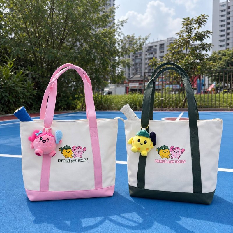 Picklé Joy Tote Bags in Dusty Pink and Court Green with Picklé and Ollie Pop plushie keychains - pickleball gift Singapore