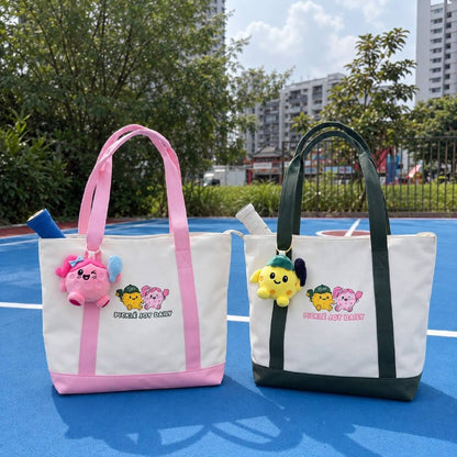Picklé Joy Tote Bags in Dusty Pink and Court Green with Picklé and Ollie Pop plushie keychains - pickleball gift Singapore